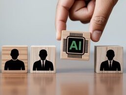 Hand holding a block with "AI" surrounded by wooden blocks depicting people silhouettes.