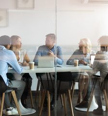 Satff meeting in retail environment