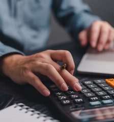 Payroll calculations on office desk